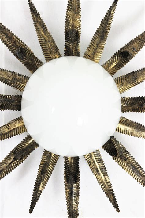 French Sunburst Starburst Light Fixture Gilt Metal And Milk Glass For