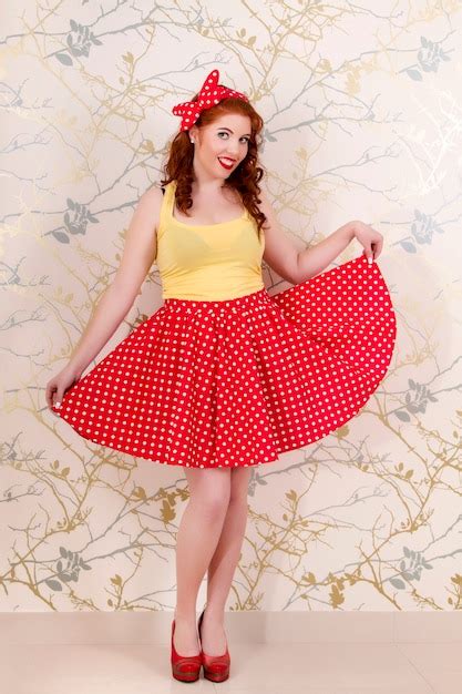 Premium Photo View Of A Beautiful Pinup Redhead Girl With Skirt