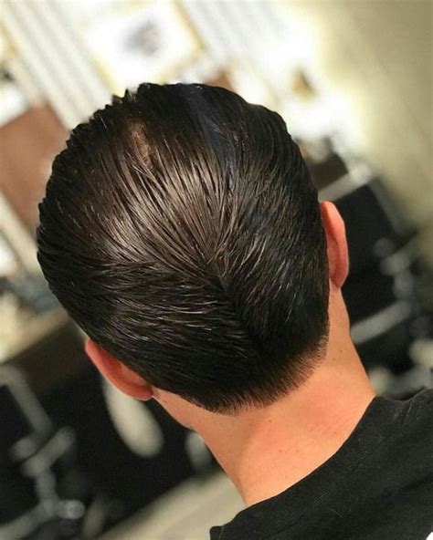 Discover a 1950s throwback, the ducktail haircut for men. #beard #ducktail #beard (With images) | Slick hairstyles, Sleek haircuts, Hair and beard styles
