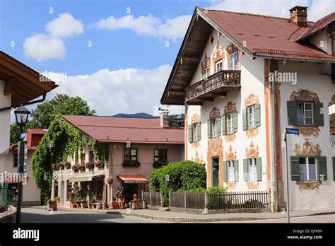 Typical Traditional Alpine Buildings In Bavarian Town Of Oberammergau