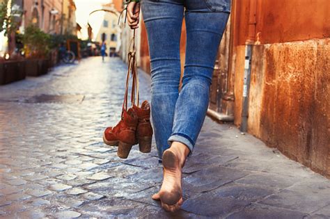 Barefoot Woman Walking On Street Stock Photo Download Image Now Istock