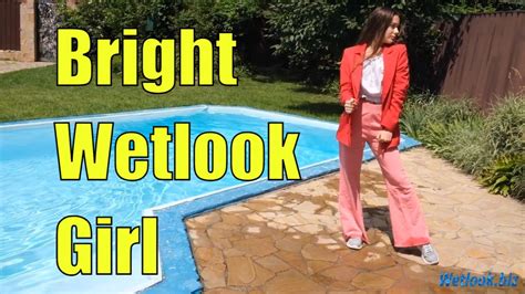 wetlook girl in blouse swimming in the pool bright wetlook girl wetlook fully clothed girl