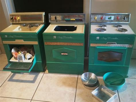 my collection of the large size suzy homemaker toy appliances left to right dishwasher sink