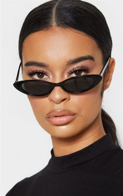 All Over Black Slim Cat Eye Sunglasseselevate Your Everyday Look With These Sunglasses Doll