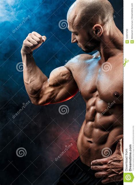 Strong Bodybuilder Man With Perfect Abs Shouldersbiceps Triceps