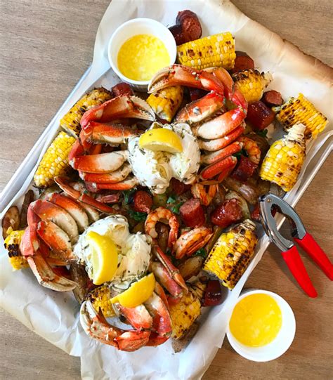 In a 12qt stockpot, add orange juice and apple juice add cajun seasoning (can be store bought) add. The Easy Summer Crab Boil