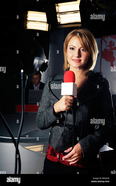 Smiling Television News Reporter In Live Transmission With Braking News