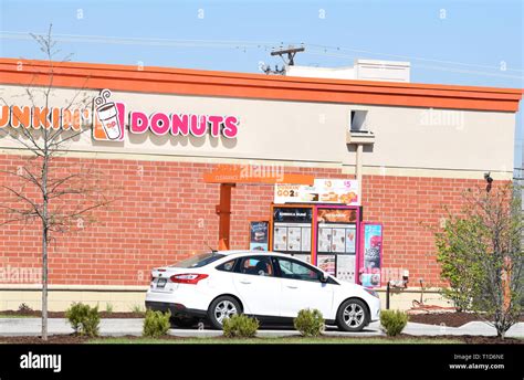 Dunkin Donuts Donut Shop Drive Thru And Drive Thru Menu Stock Photo