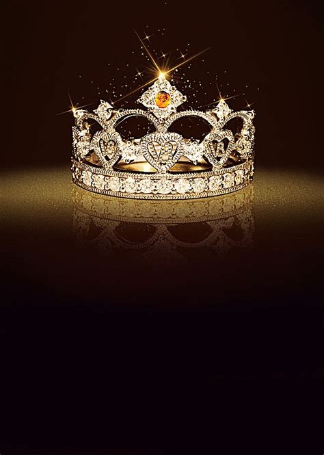 A Gold And White Tiara With Diamonds On Its Sides Against A Black