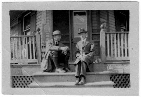 Two Unidentified Men Sitting On A Porch Side 1 Of 1 The Portal To