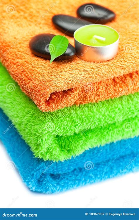 Multi Colored Bath Towels And Black Spa Stones Stock Image Image Of