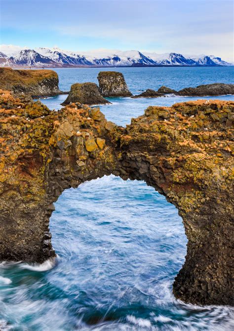 This Impressive Arch Rock Is Located In Arnarstapi On Snaefellsnes