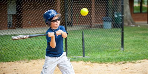Boy Hitting Baseball Deer Mountain Day Camp