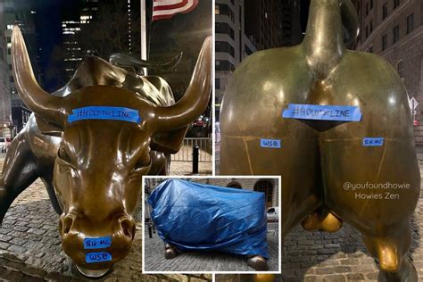 Wall Street Charging Bull Is Covered With Tarp After Being Vandalized