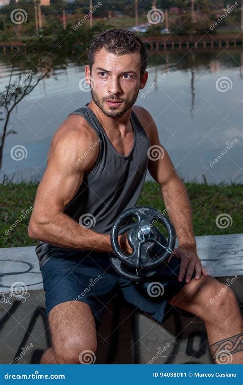 Young Man Doing Bicep Curls Stock Image Image Of Bicep Practicing