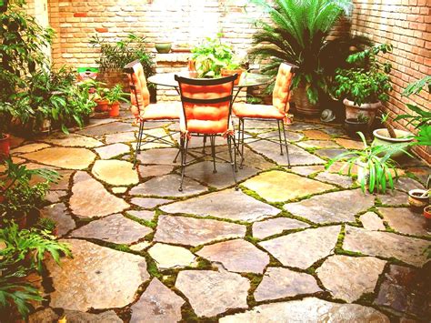 You can do the job yourself for $3 to $5 per square foot. Small Stone Patio Backyard Inexpensive Patios On A Budget Ideas Do It Yourself Stones With Fire ...