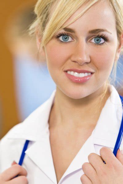 Beautiful Blond Female Nurse With Blue Eyes Stock Photo Dmbaker