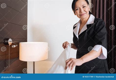 happy delighted woman working as a hotel maid stock image image of personnel casual 92517789