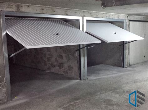 Découvrez notre gamme de portes basculantes, sectionnelles ou à enroulement, accompagnées de tous les accessoires nécessaires comme les mécanismes de motorisation. porte de garage basculante sur mesure - Les menuiseries ...