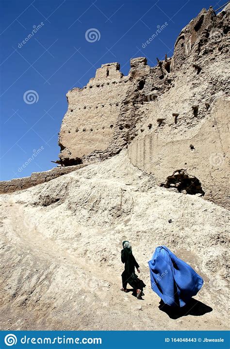 A Girl And Woman Walk Over The Wall Of The Citadel In Ghazni