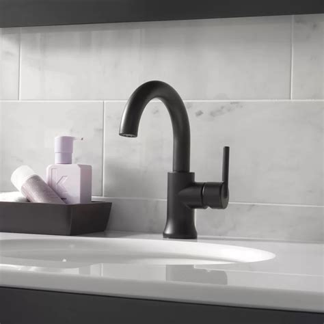 When paired with a chrome trinsic single hole mount lavatory faucet, this gorgeous minimalist modern bathroom is the epitome of european. Delta Trinsic® Single Hole Bathroom Faucet with Drain ...