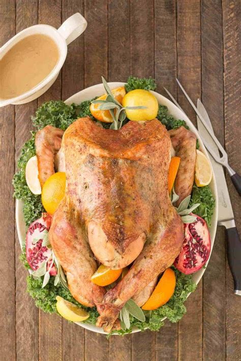 juicy moist and super flavorful this herb roasted turkey should be at the center of your