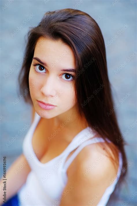 Portrait Of Young Serious Girls Long Haired Brunette With Beautiful