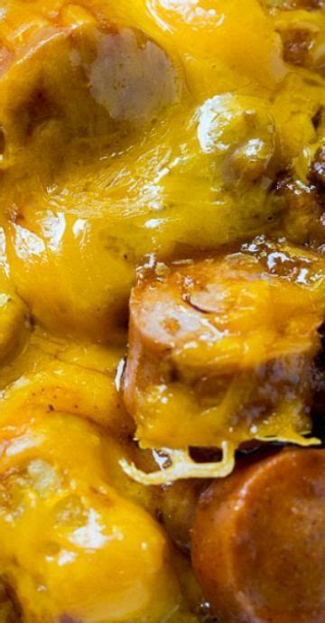 Hot dogs, canned chili & beans, cheese, and tater tots. Cheesy Hot Dog Tater Tot Casserole - Spicy Southern ...