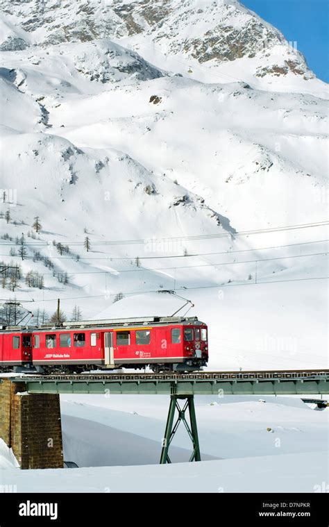 Mountain Train At Lago Bianco Bernina Pass In Winter Grisons