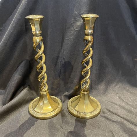 An Elegant Pair Of Brass Candlesticks With Twisted Stem Antique Brass
