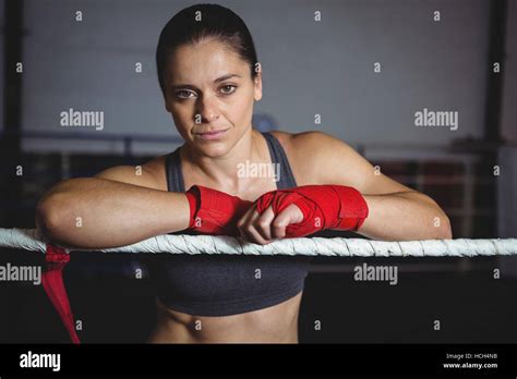 Confident Female Boxer Leaning On Boxing Ring Stock Photo Alamy