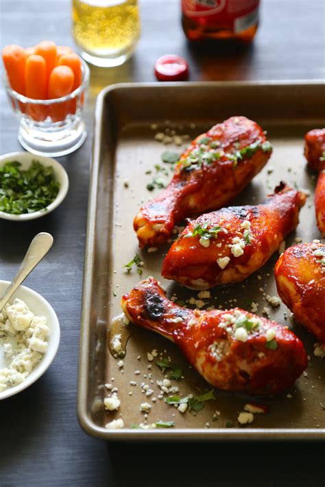 Line a baking sheet with parchment paper. baked buffalo spicy chicken drumsticks with blue cheese ...