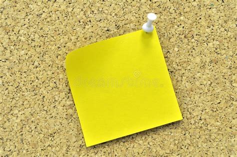 Yellow Sticky Note On A Cork Board Stock Image Image Of Empty