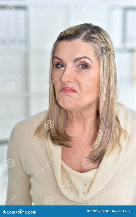 Portrait Of Angry Mature Woman Looking At Camera Stock Photo Image Of