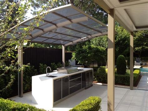 The range also includes smoking shelters and timber shelters. A Cantaport shade structure used to protect an outdoor BBQ ...