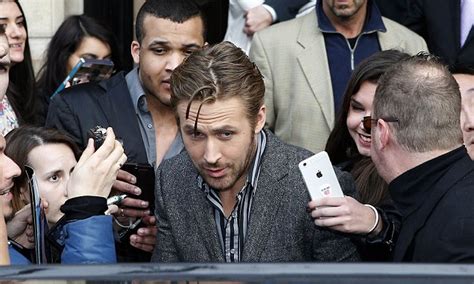Ryan Gosling Is Overwhelmed By Adoring Fans As He Leaves Paris Hotel Daily Mail Online