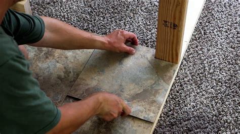 We recently have had trafficmaster resilient vinyl flooring installed in our kitchen. Trafficmaster Vinyl Tile flooring review peel and stick flooring - YouTube