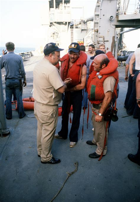 Us Navy Personnel Aboard The Ammunition Ship Uss Mount Hood Ae 29