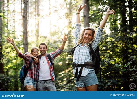 Beautiful Woman And Friends Hiking In Forest Stock Image Image Of