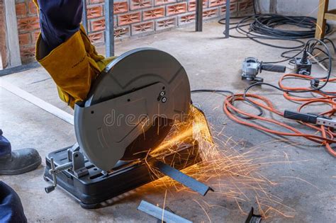 A Worker Using A Fiber Machine Cutting Steel Sparks Stock Photo Image