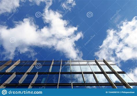 Modern Office Building With Mirrored Glass Windows