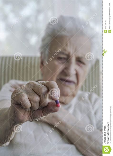 Senior Woman Holding A Pill Stock Photo Image Of Dose Hands 102149126