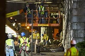 New York's Brooklyn Bridge Collapse Buries Family in Rubble
