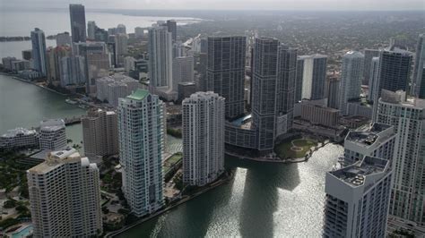 5k Stock Footage Aerial Video Fly Over Miami River To Approach High