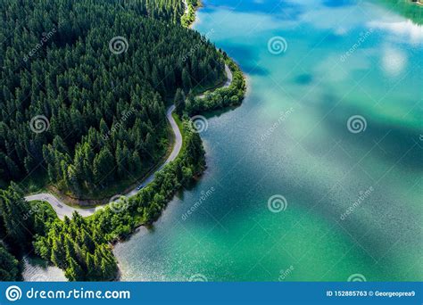 Mountain Lake With Turquoise Water And Green Trees