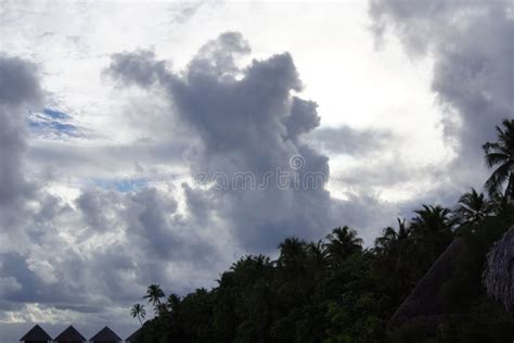 Cloudy Sky Over A Tropical Island Resort In The Evening Stock Photo