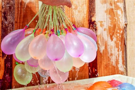 Filling Colorful Water Balloons Stock Photo Image Of Kids Background