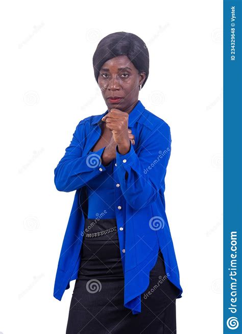 Beautiful Mature Business Woman In Anger Clenches Her Fists Stock Photo