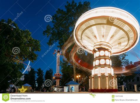 Rotating Carousel Merry Go Round Summer Evening In City Amusement