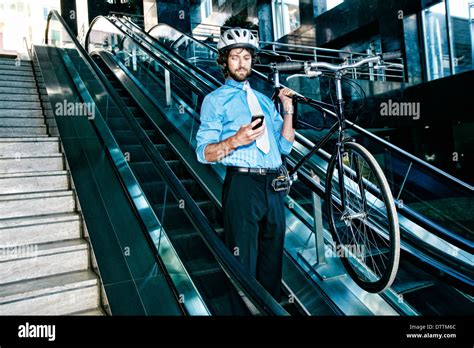 Man Riding On An Escalator Hi Res Stock Photography And Images Alamy